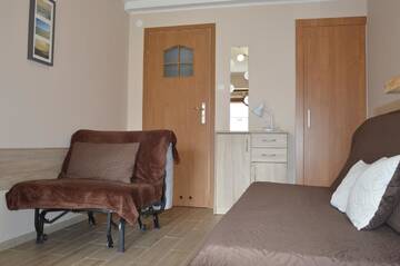 Фото номера Двухместный номер с 1 кроватью Проживание в семье Apartamenty i pokoje u Kryni г. Штутово 8